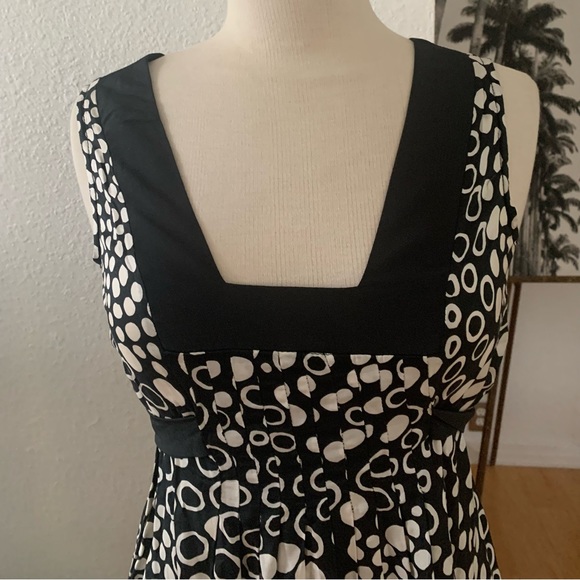 Le Lis Blanc Deux Sleeveless mini dress; black background with cream polka dots - Picture 3 of 9